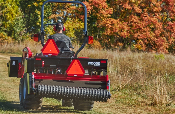 Rear view of Massey Ferguson 1E Series compact tractor with three-point hitch, highlighting its versatility for attachments.