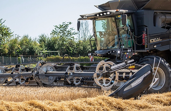 MacDon FD2 FlexDraper header paired with a Fendt IDEAL combine, working efficiently through a wheat field with exceptional residue management