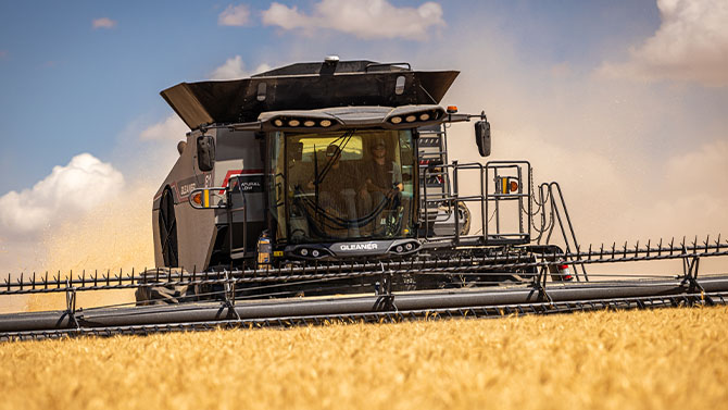 Gleaner T Series combine harvester cutting wheat in the field, showcasing precision harvesting and high-efficiency performance.